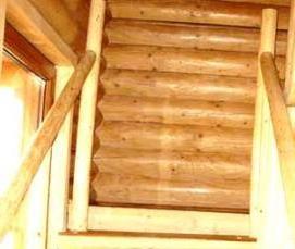 Деревянная лестница из бревна - модель 1