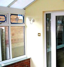 Пластиковая двухстворчатая входная дверь - модель 1