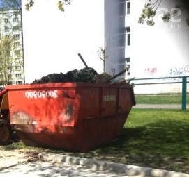 Вывоз мусора контейнером с погрузкой Москва